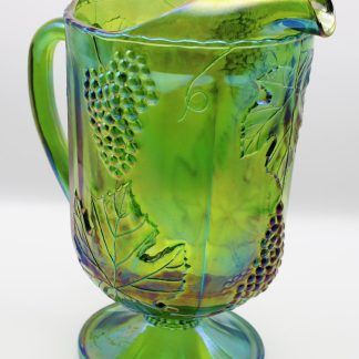 Carnival glass iridescent green pitcher